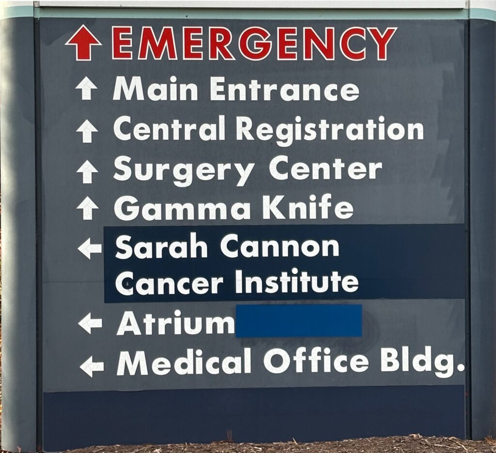 Head-on, high-resolution photo of a bad hospital sign